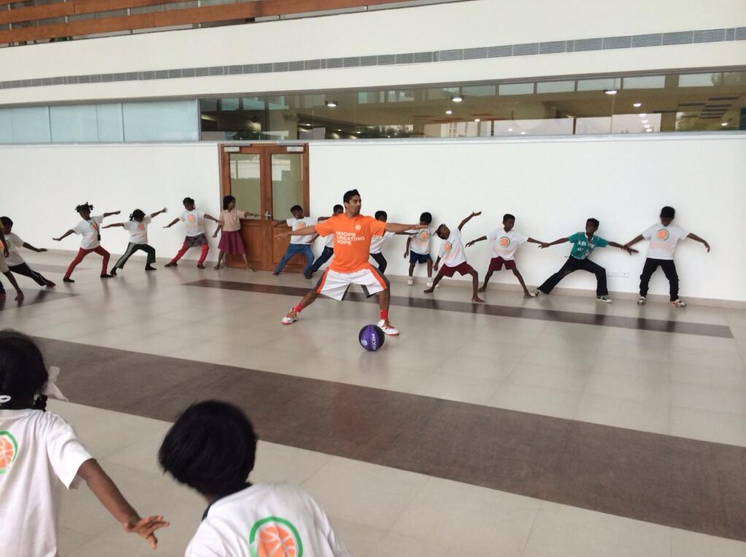 tl_files/academy-2014-photos/Yoga with Volunteer Varun.png